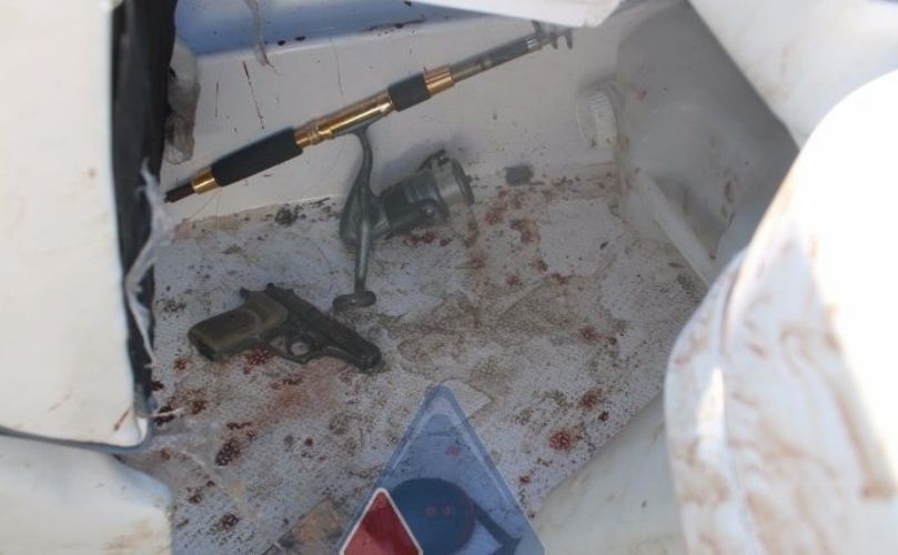 La pistola calibre 380 hallada y la sangre en la lancha que conducía Matías Messi. 