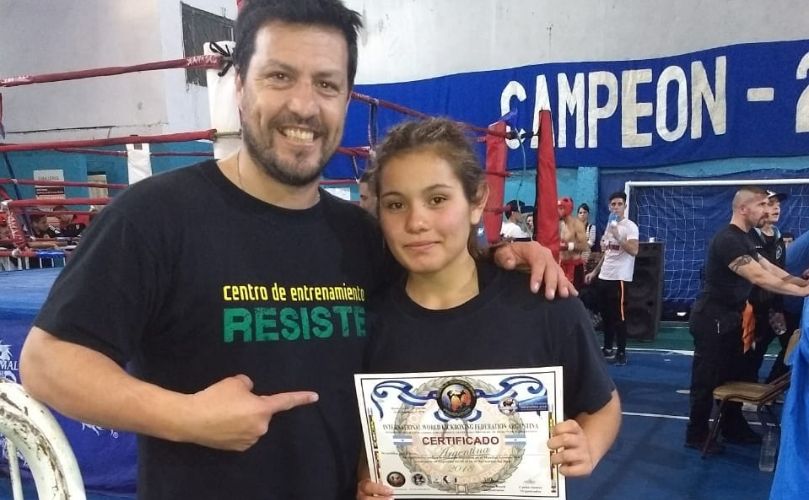 Bianca junto a su entrenador 